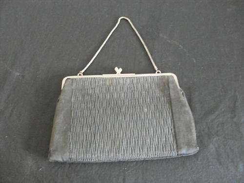 Very very old evening bag.  Condition is suitable for it's age.